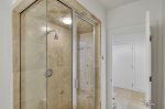 King Ensuite Bathroom Features a Walk-In Steam Shower